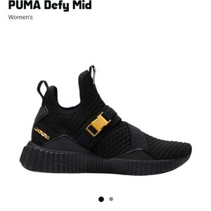 PUMA defy mid women's size 7, black and gold
